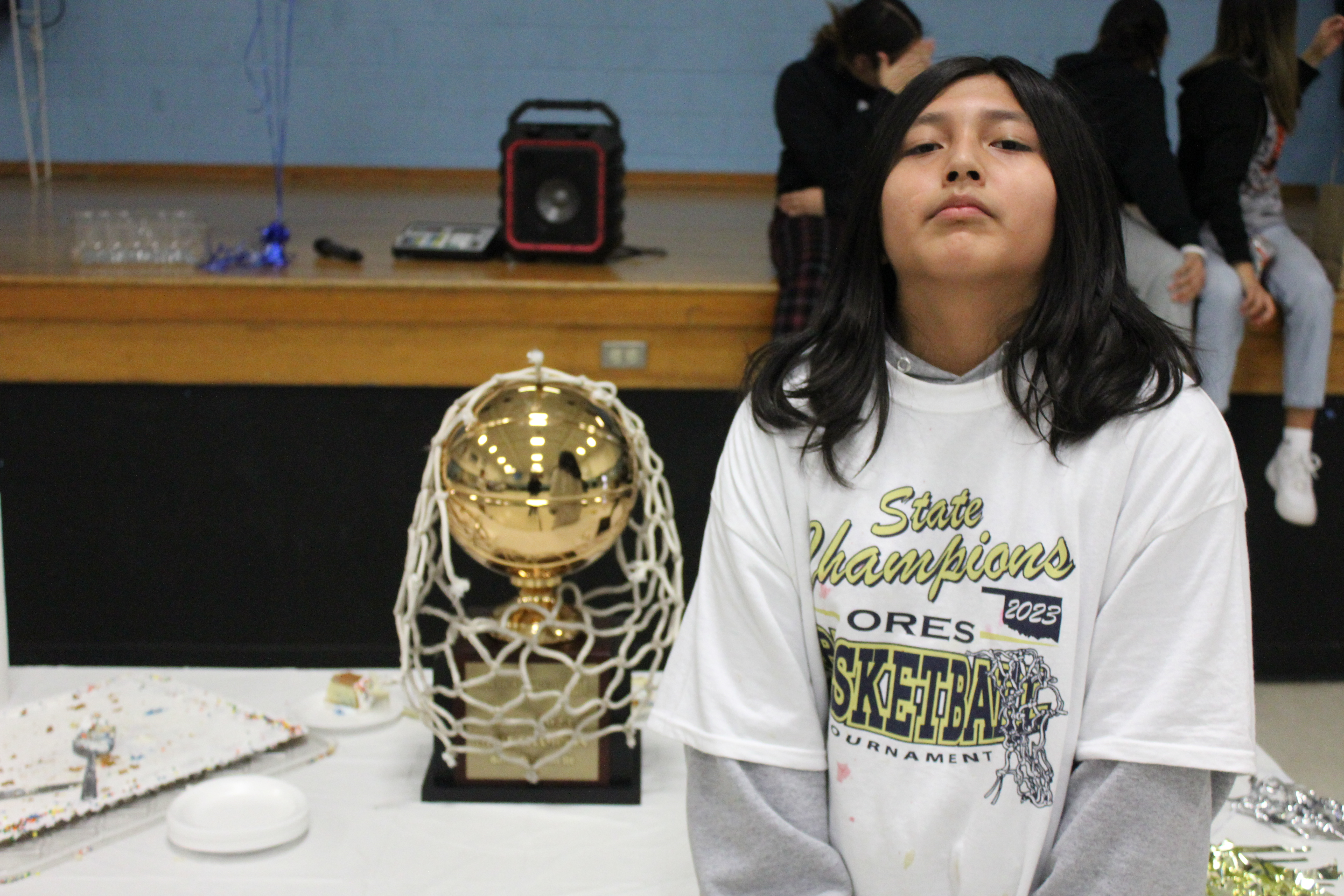 student with trophy