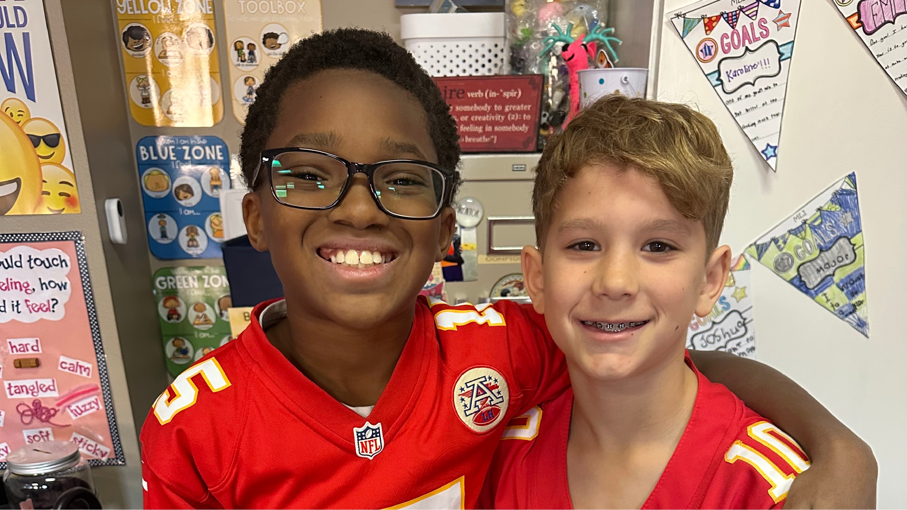 two boys in jerseys