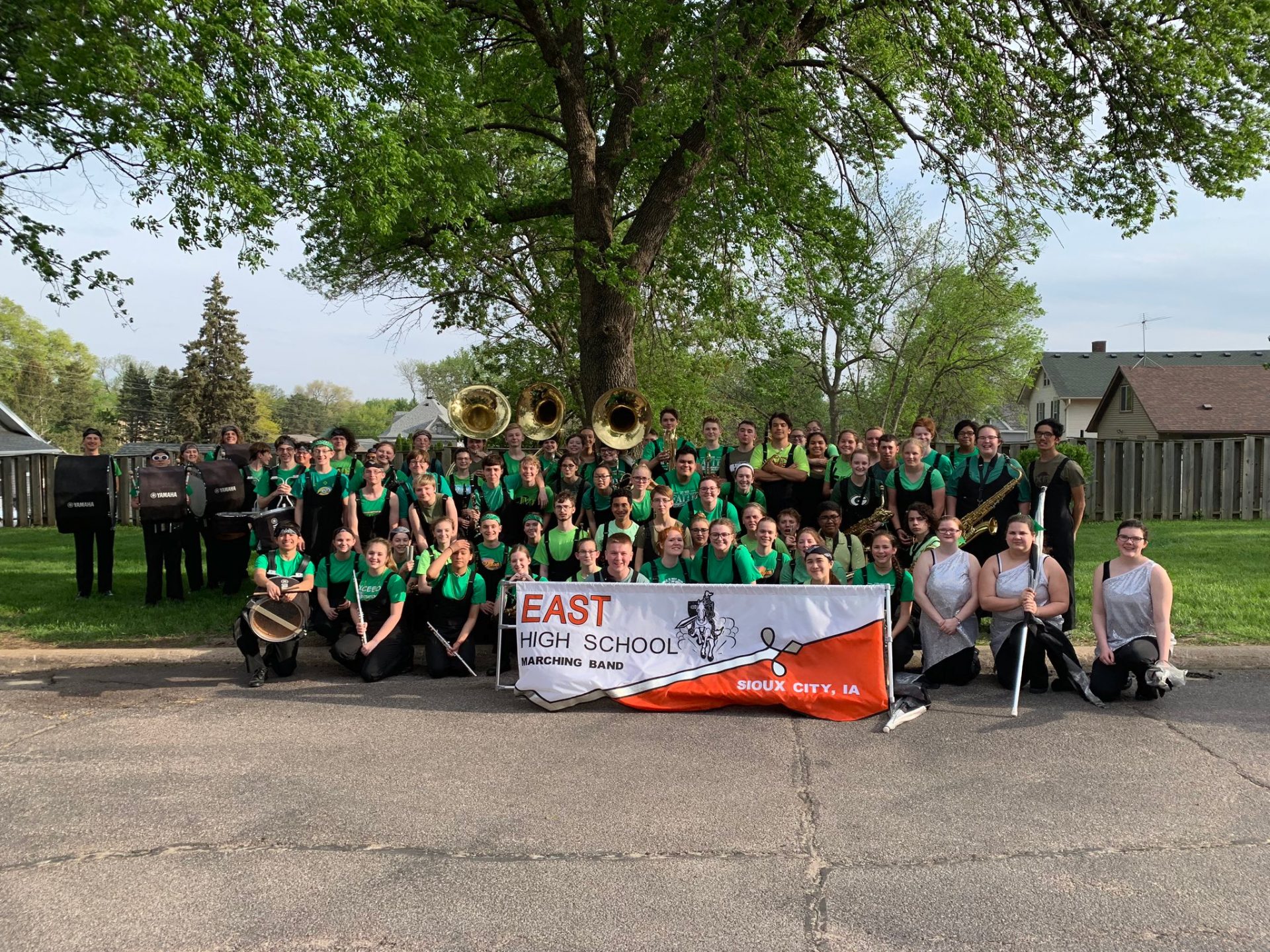 EHS Band at the parade in green to show their support for "Dr. Rogers Strong."