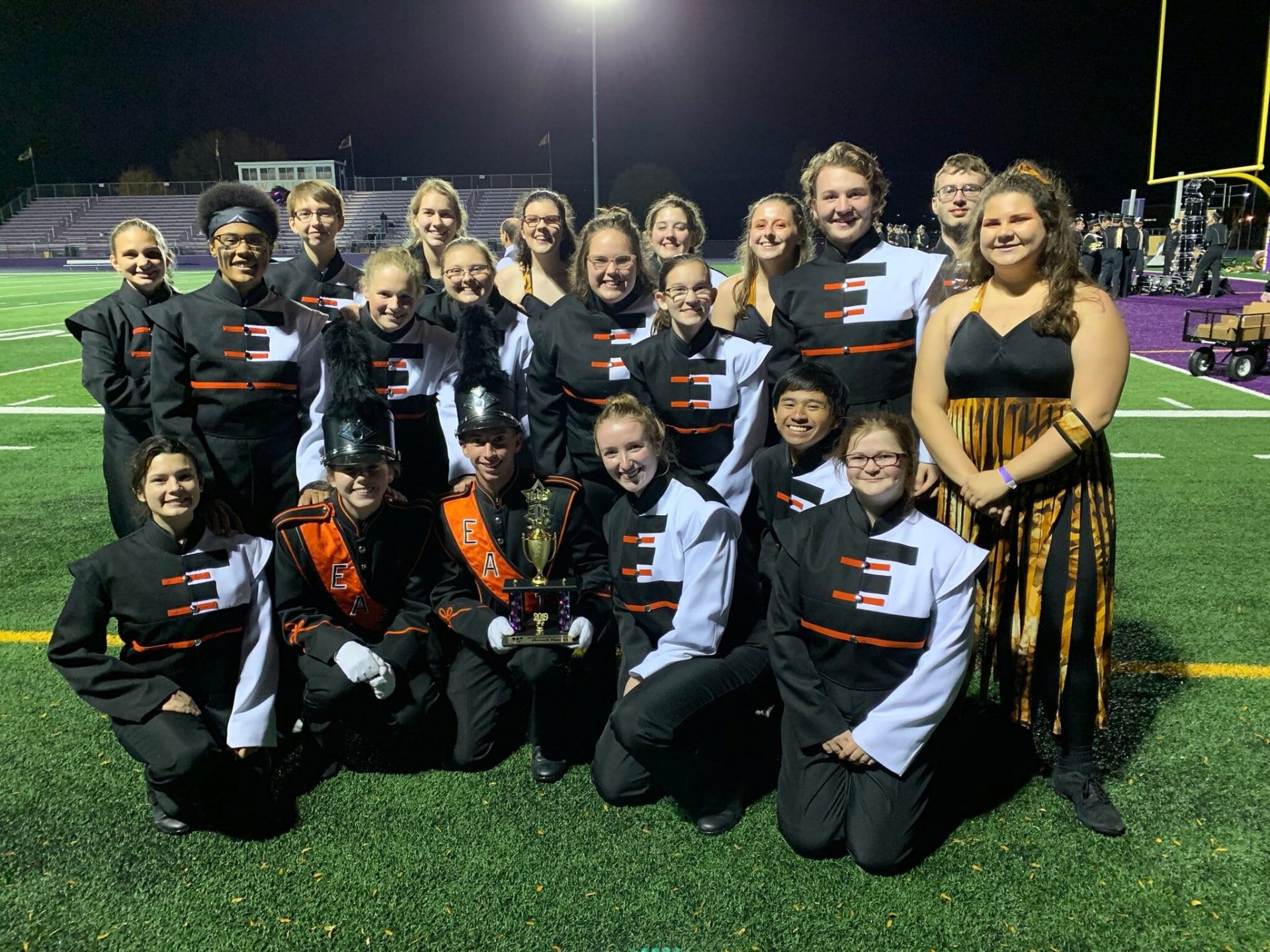 EHS Marching Band Seniors Pose on the Field