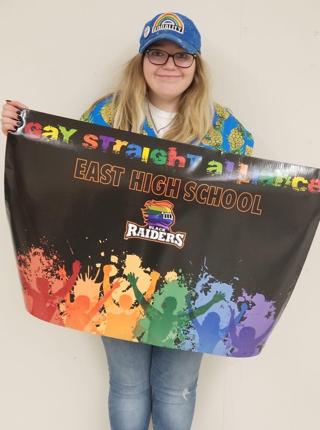 EHS GSA Student Demonstrates the Club Flag