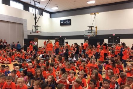 Raiders Together Elementary School Assembly With Orange School Spirit