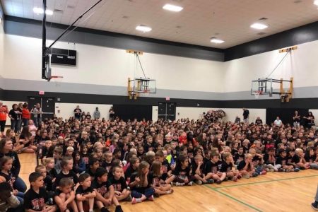 Raiders Together Elementary School Assembly With Black School Spirit