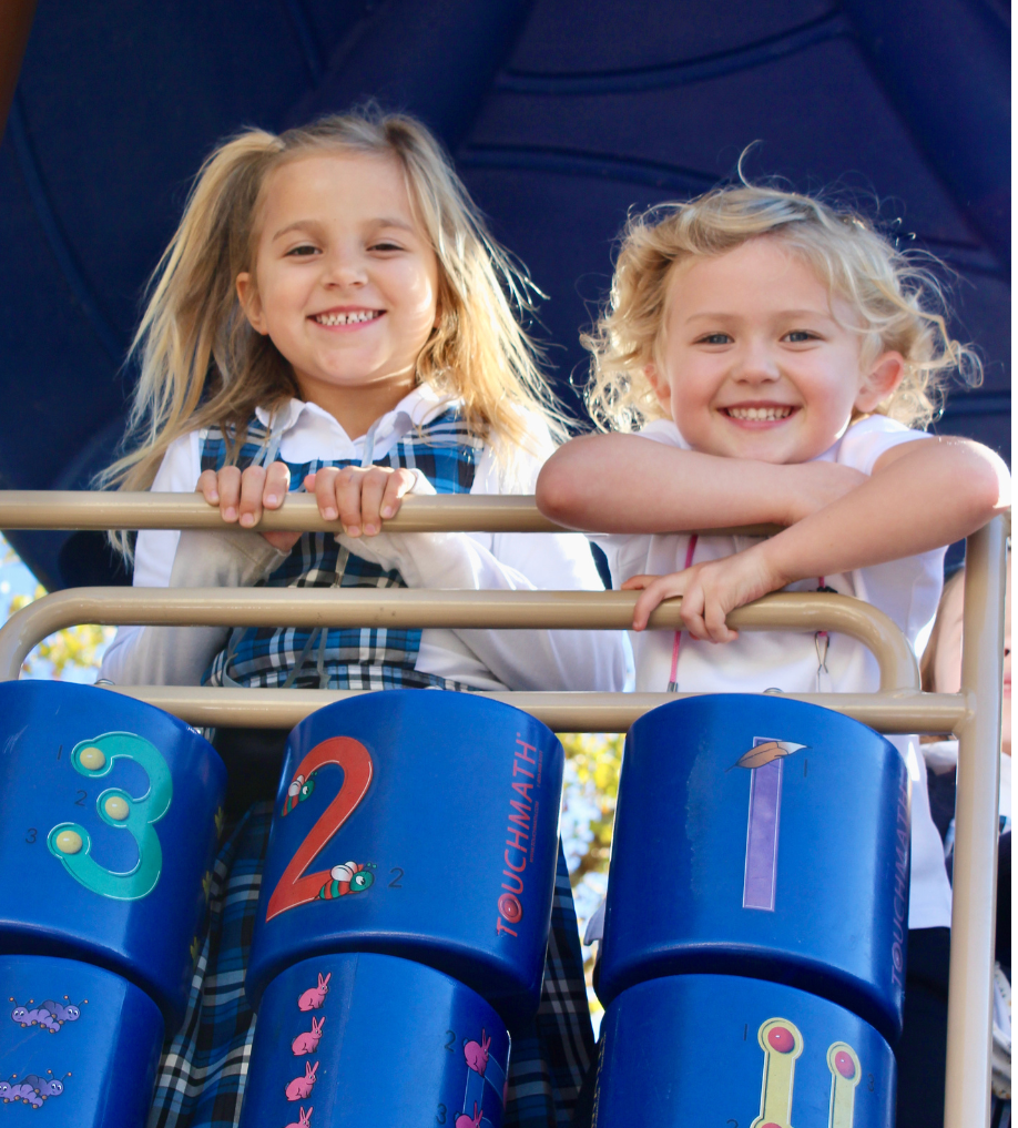 two students smiling