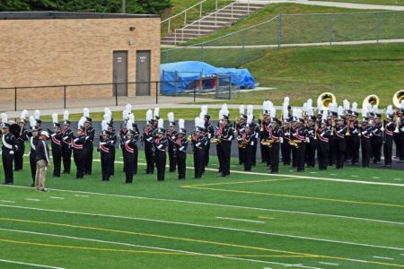 North High School Marching Band Takes the Field in Full Uniform