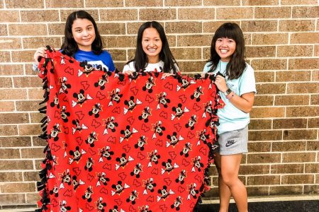 Members of NHS Student Council Make Tie Blankets for the Ronald McDonald House During the 2019-2020 School Year