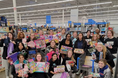 West High Girls Basketball Team Participates in Adopt a Family, a Community Service Event