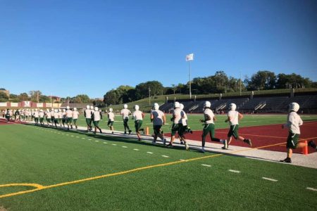 WHS Football Team Runs Onto Field