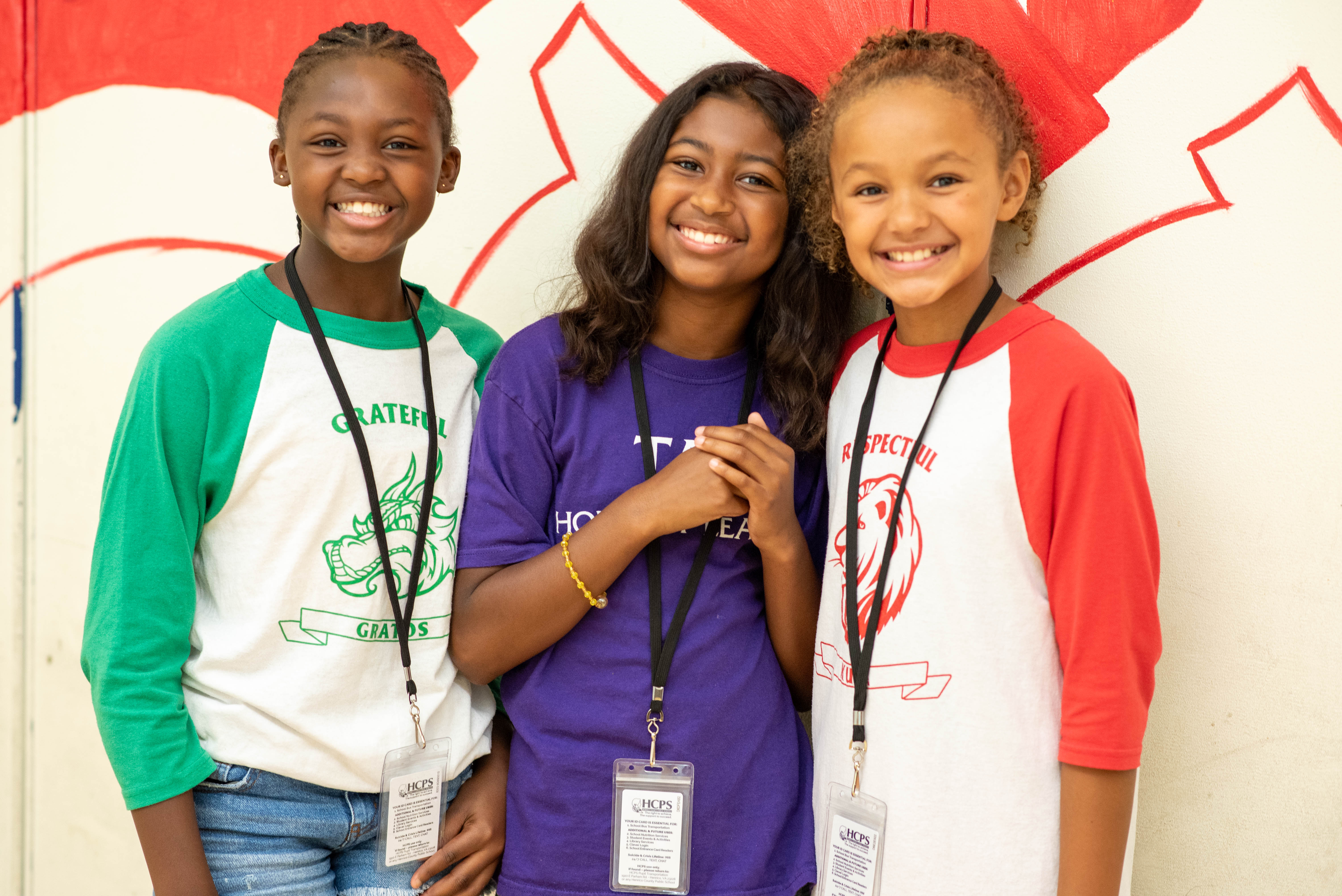 Students wear Henrico's new student ID cards on a lanyard. 