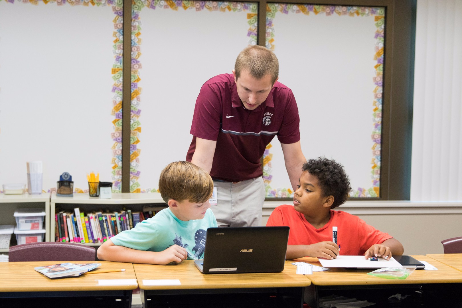 two students and teacher