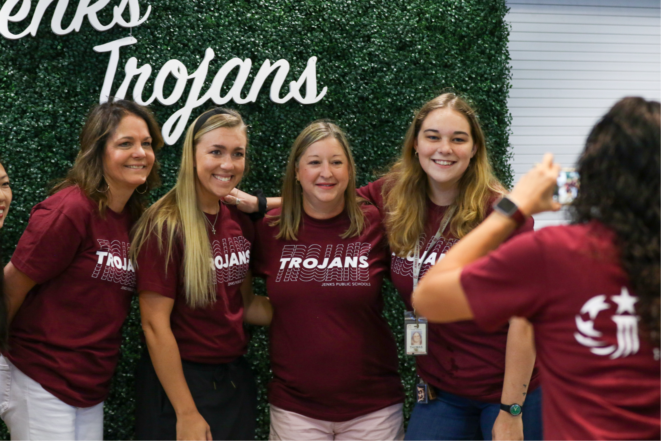 JPS employees smiling at camera at back to school rally