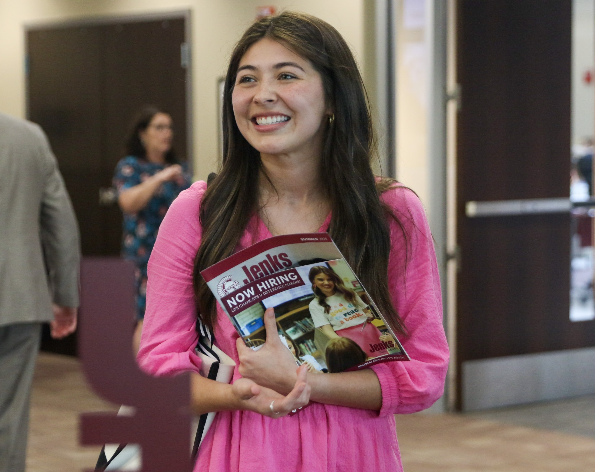 girl smiling at job fair