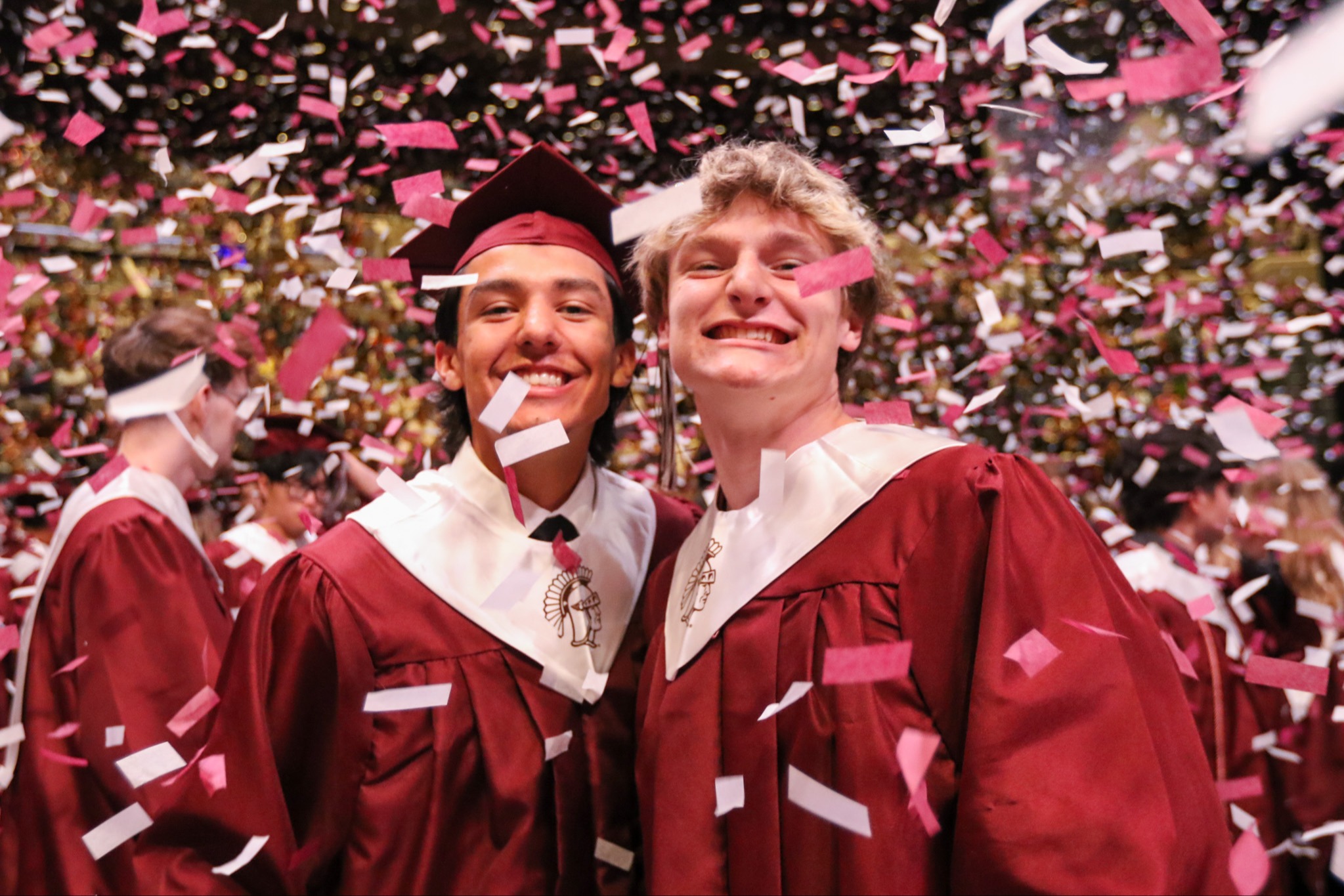 Jenks graduates smiling