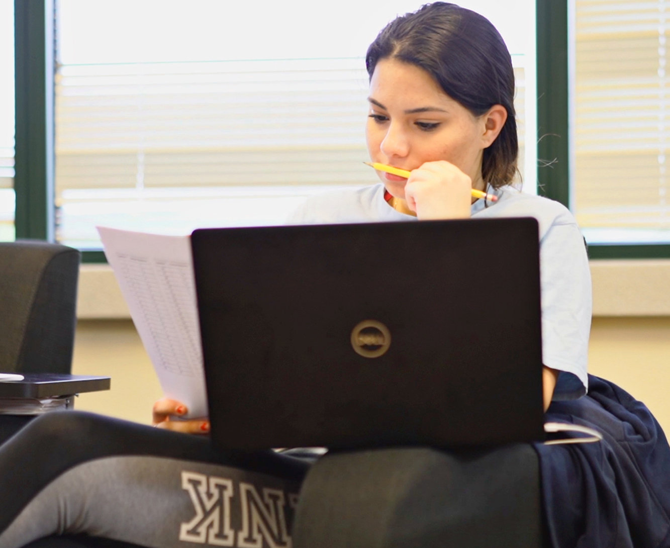 A student working on their laptop