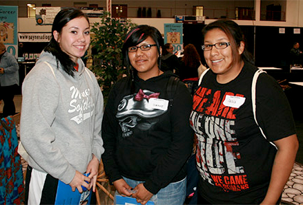 Three students at the Career Fair