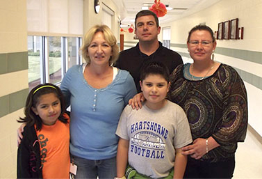 A family posing for a picture