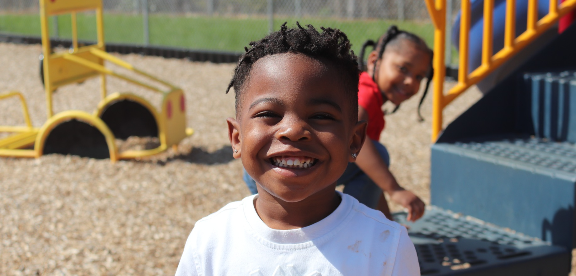 Student smiling on playground