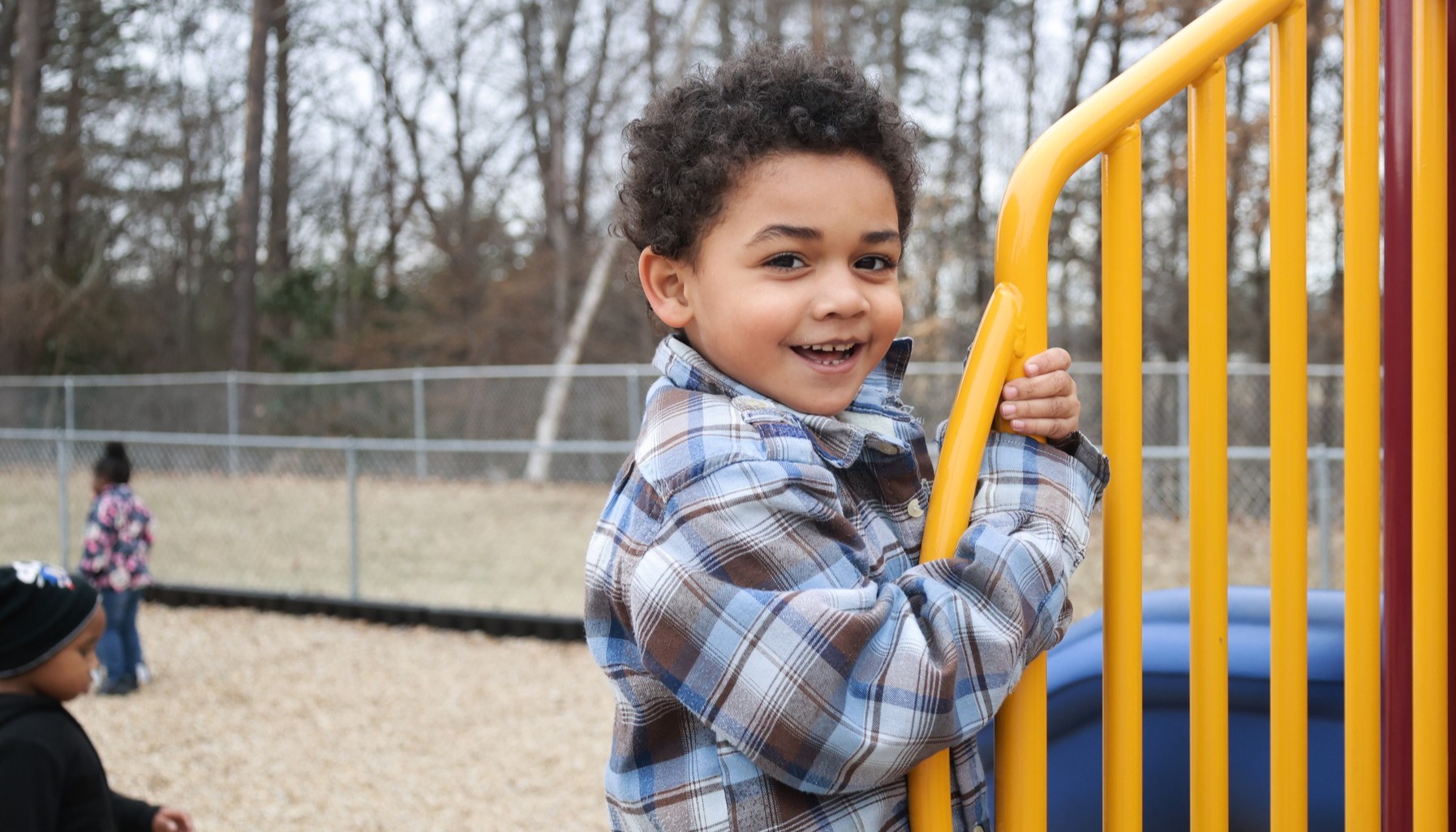 Student smiling on playground