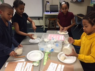 photos of science staff doing experiments with students