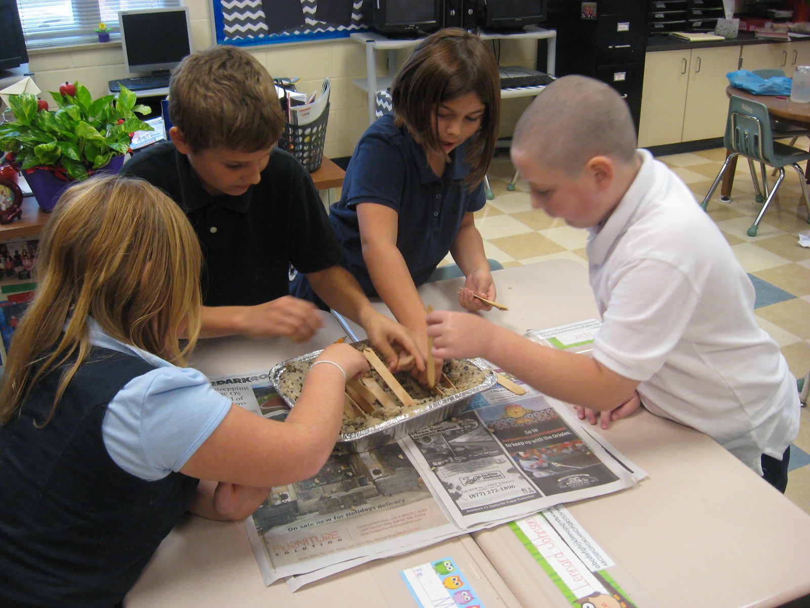 photos of science staff doing experiments with students