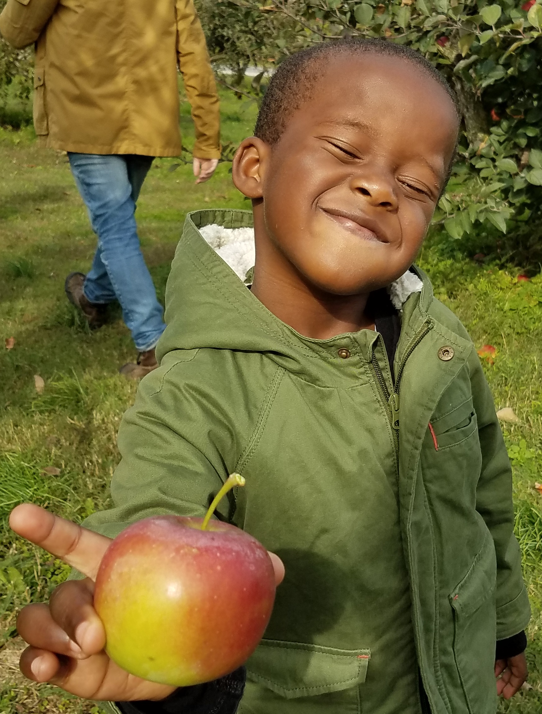 child with apple