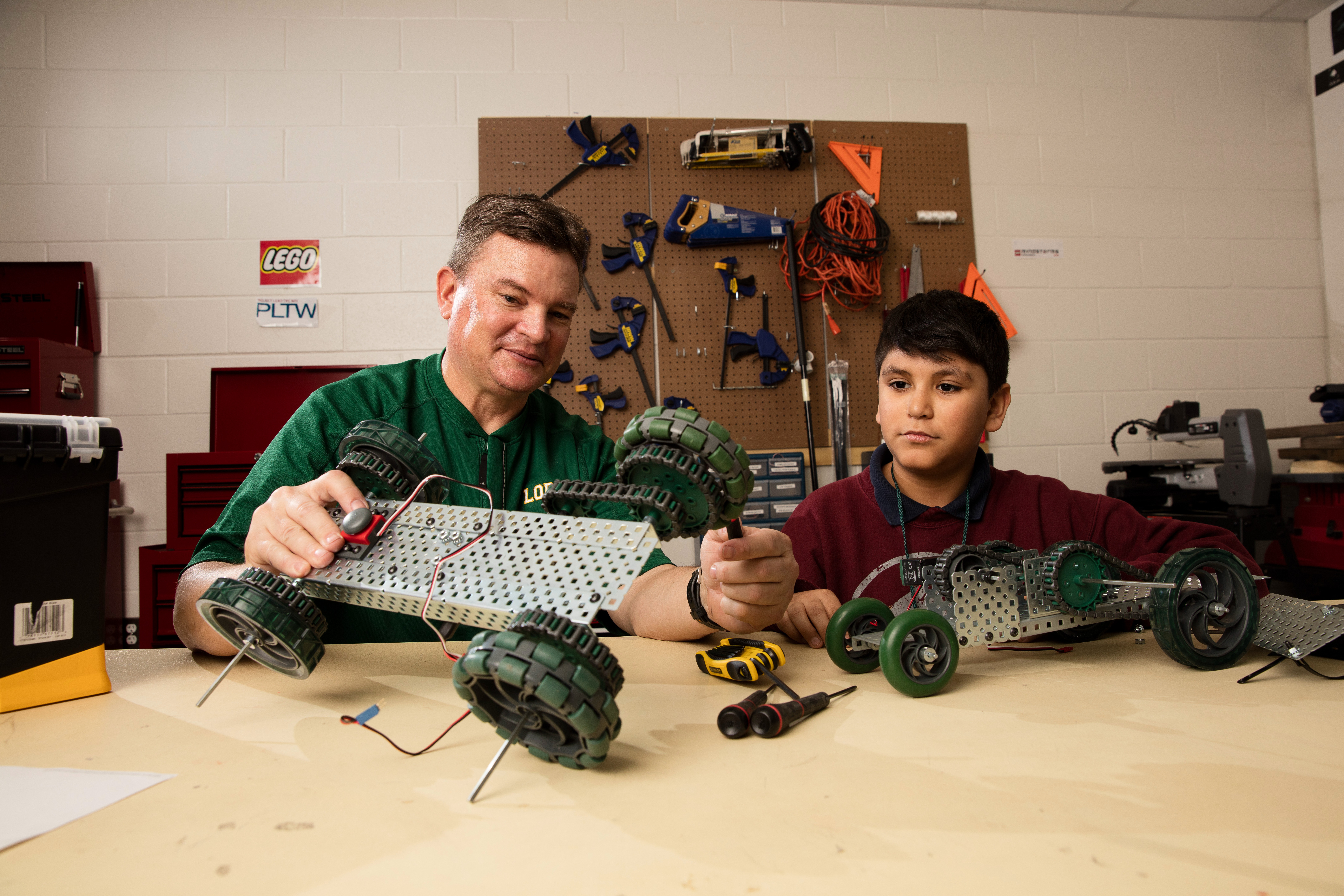 student working on robot