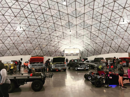 inside the dome with cars for a car show