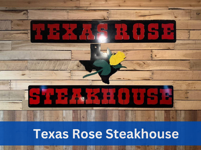 Texas Rose Steakhouse sign on wood wall