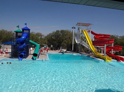 2 large water slides at swimming pool 