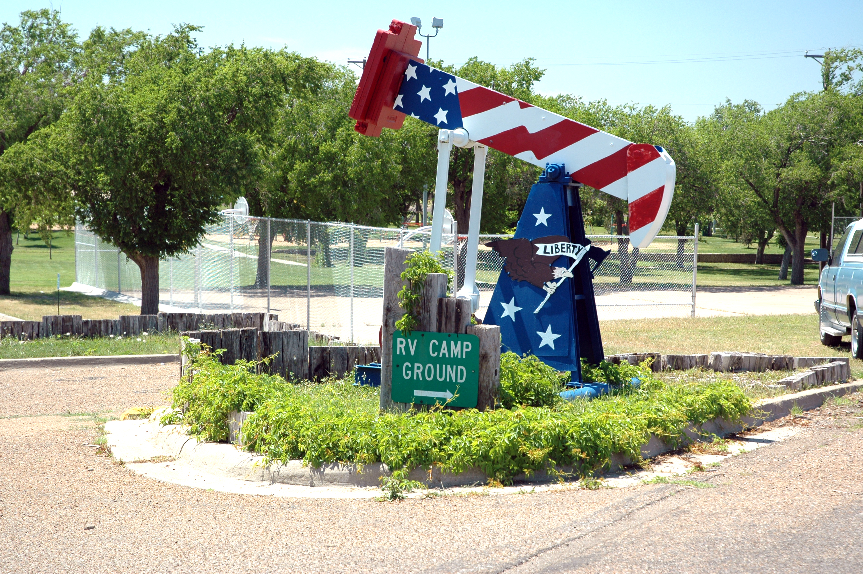 sign in the middle of road for RV campground