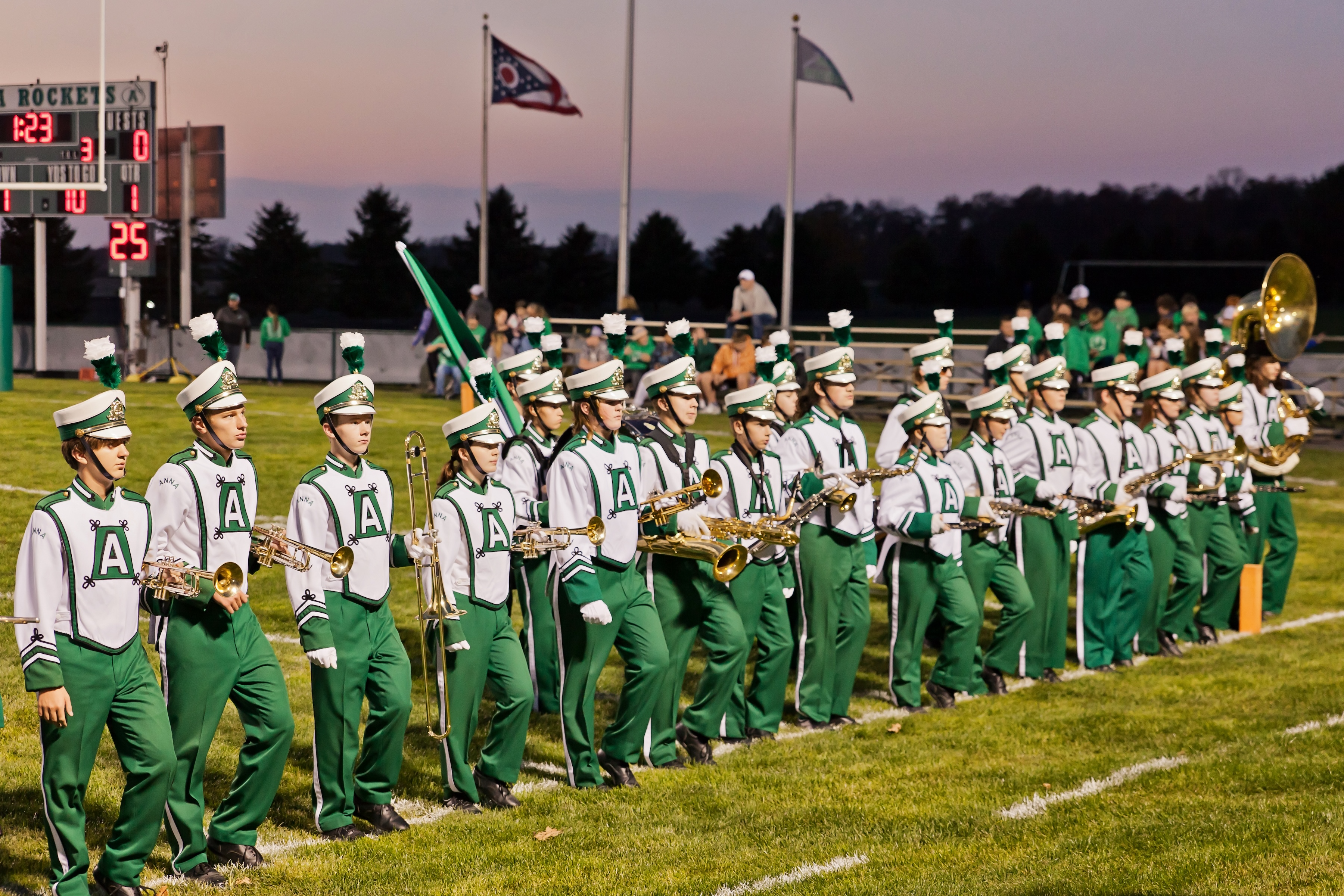 image of anna band outside in field playing