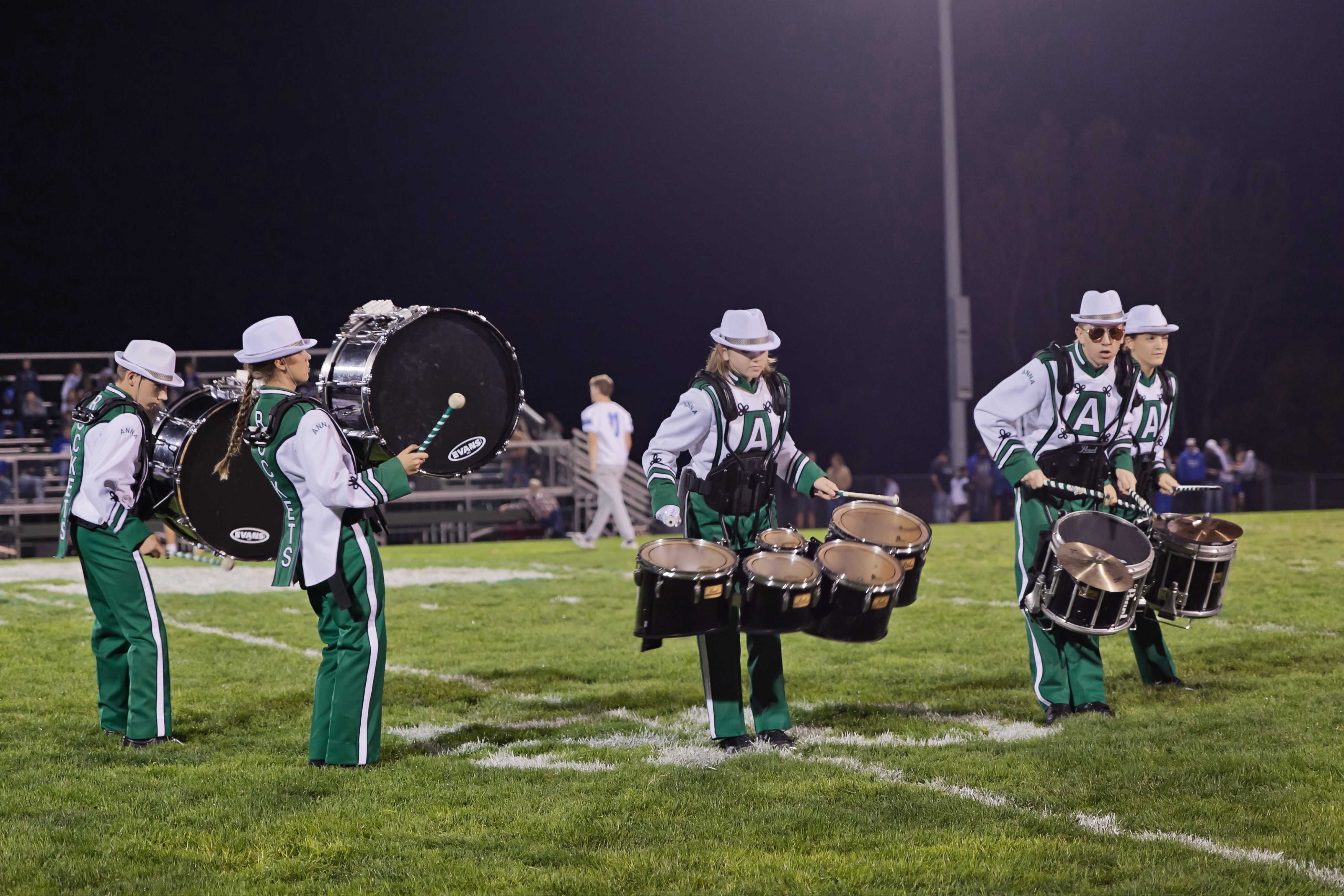 Anna Band percussion section playing on field