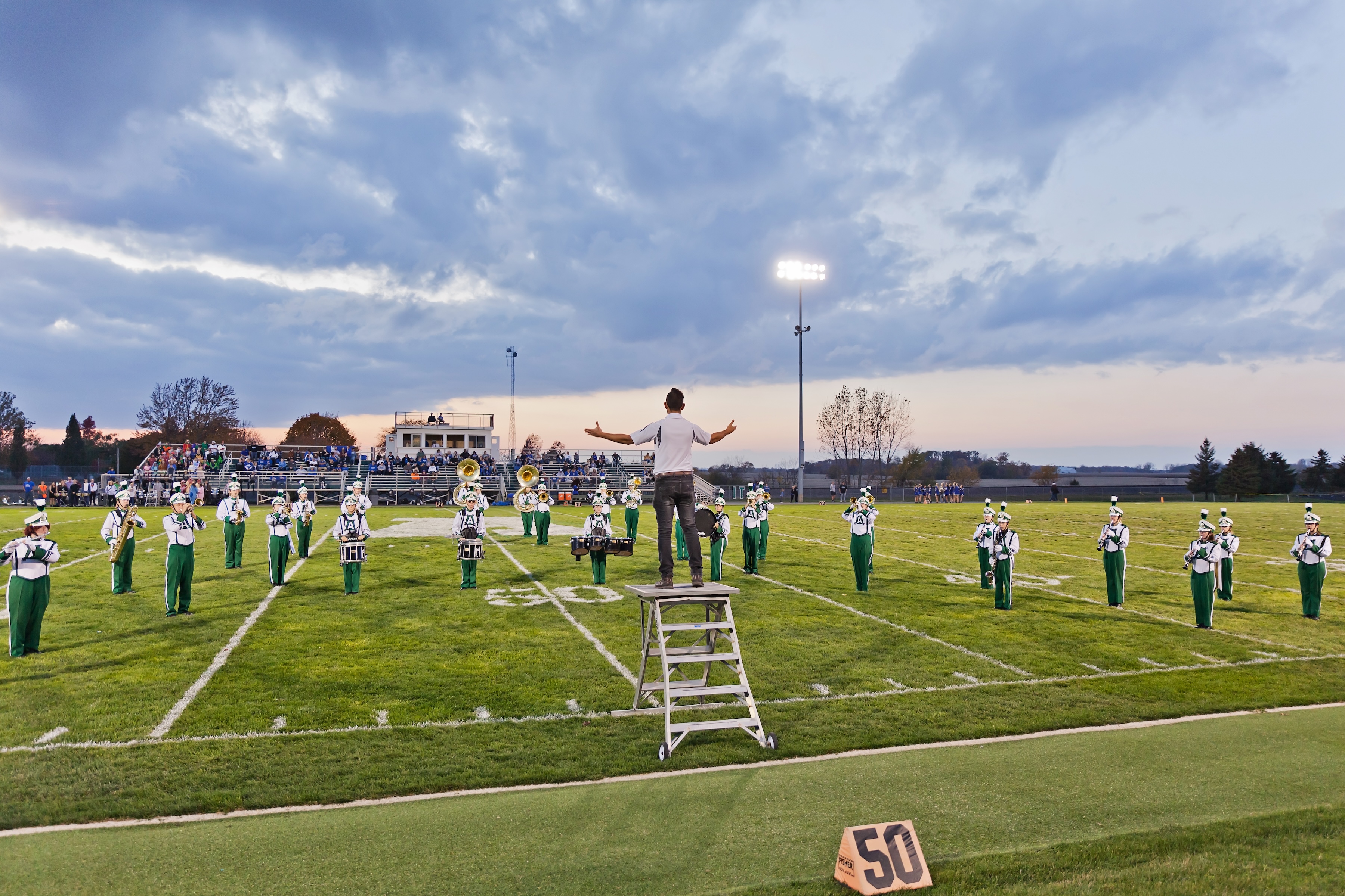 Anna Band at attention on football field