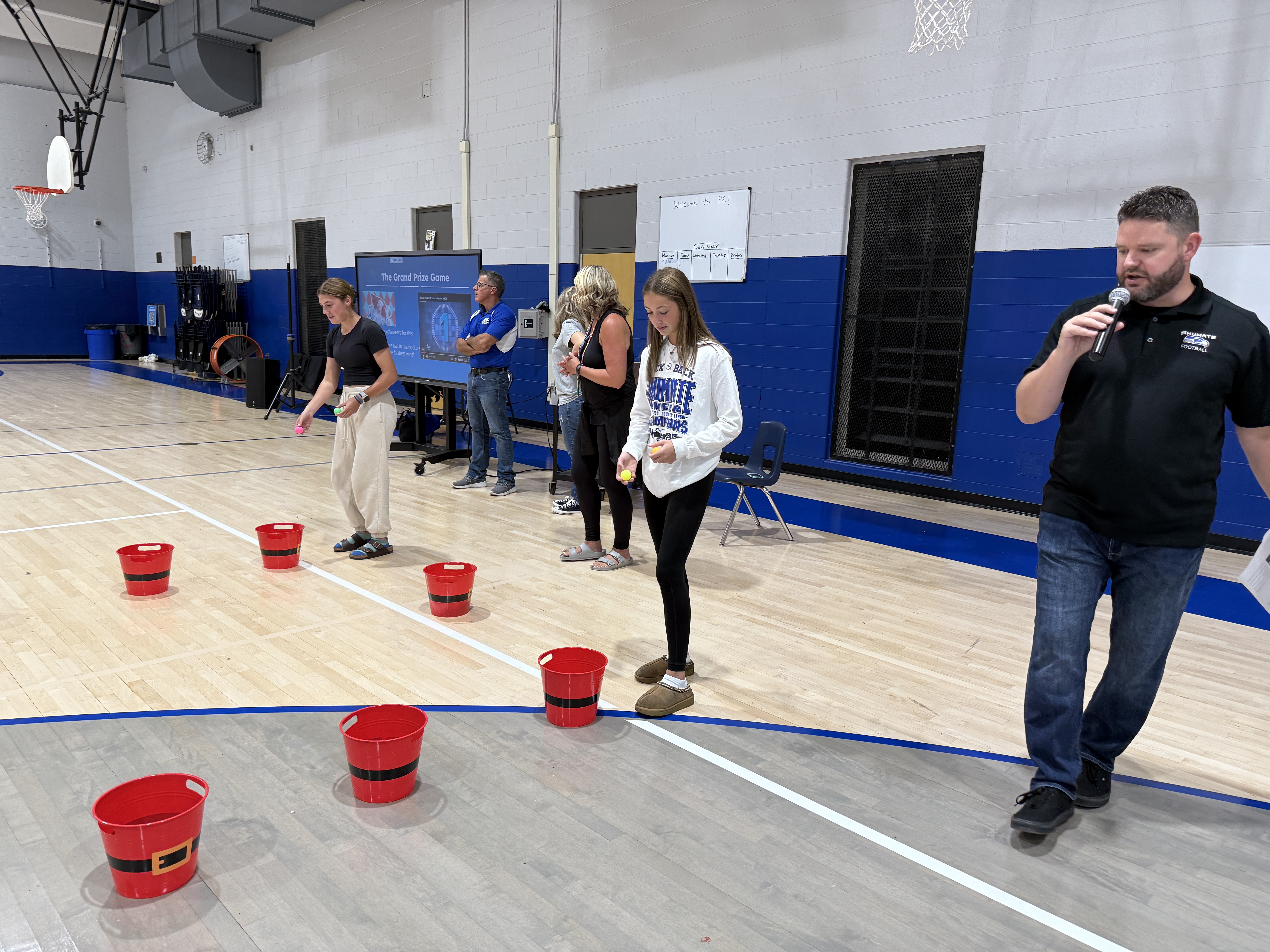 Shumate Students playing a game at an assembly