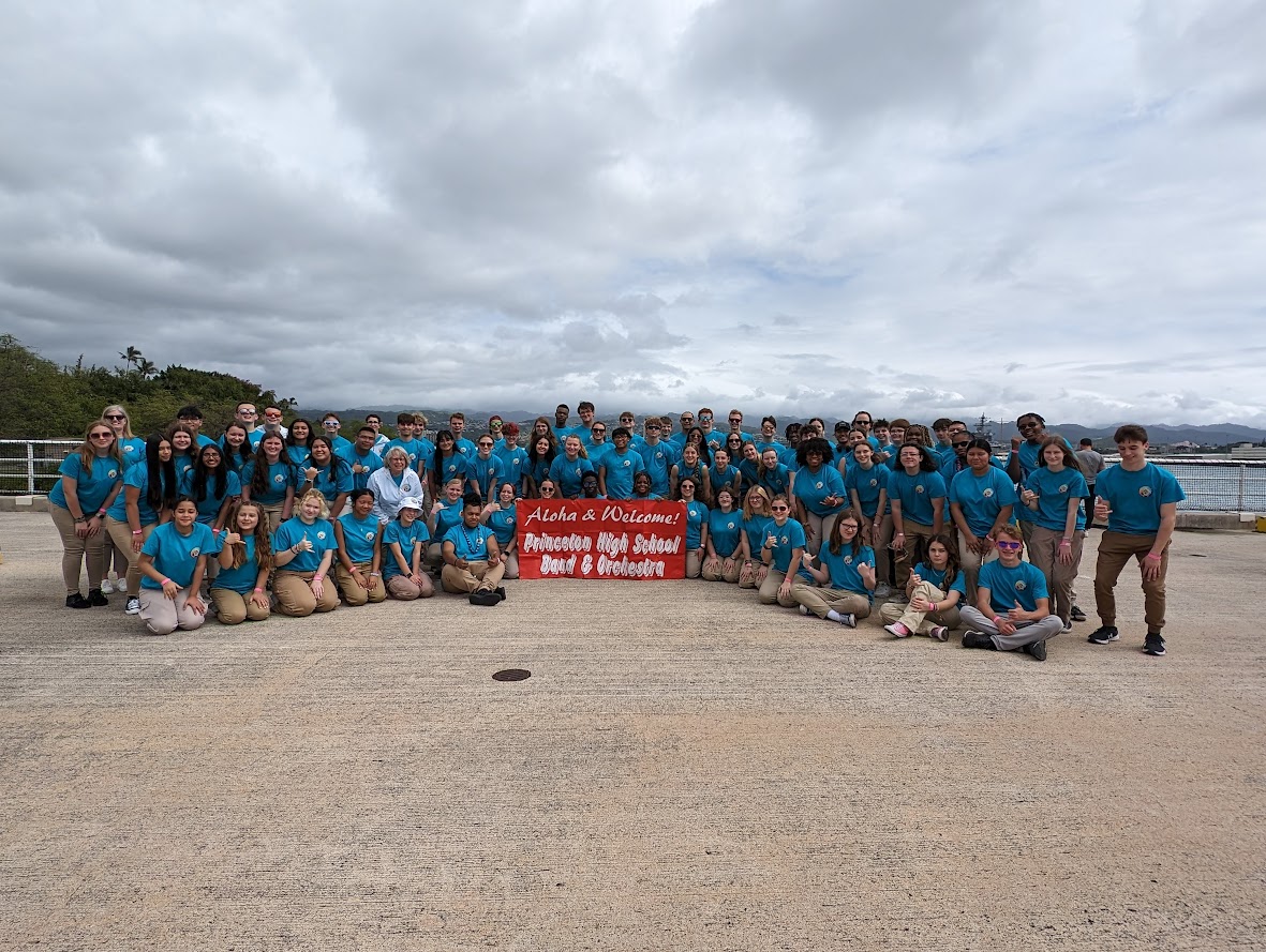 Photo of all students on the deck at Pearl Harbor