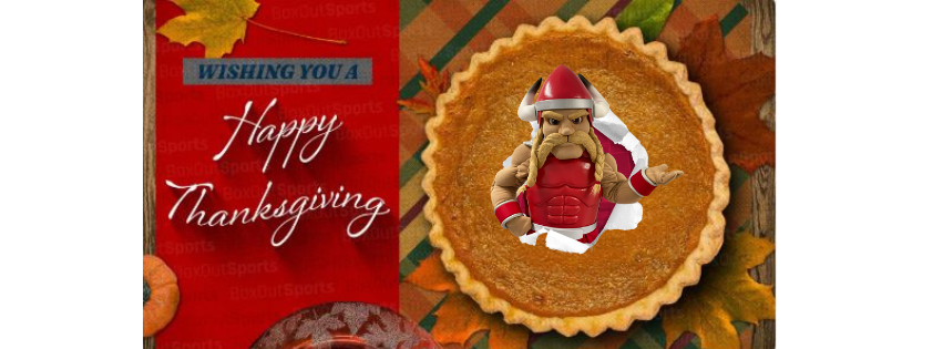 Happy Thanksgiving! Viking bursting out of a whole pumpkin pie with fall leaves in background