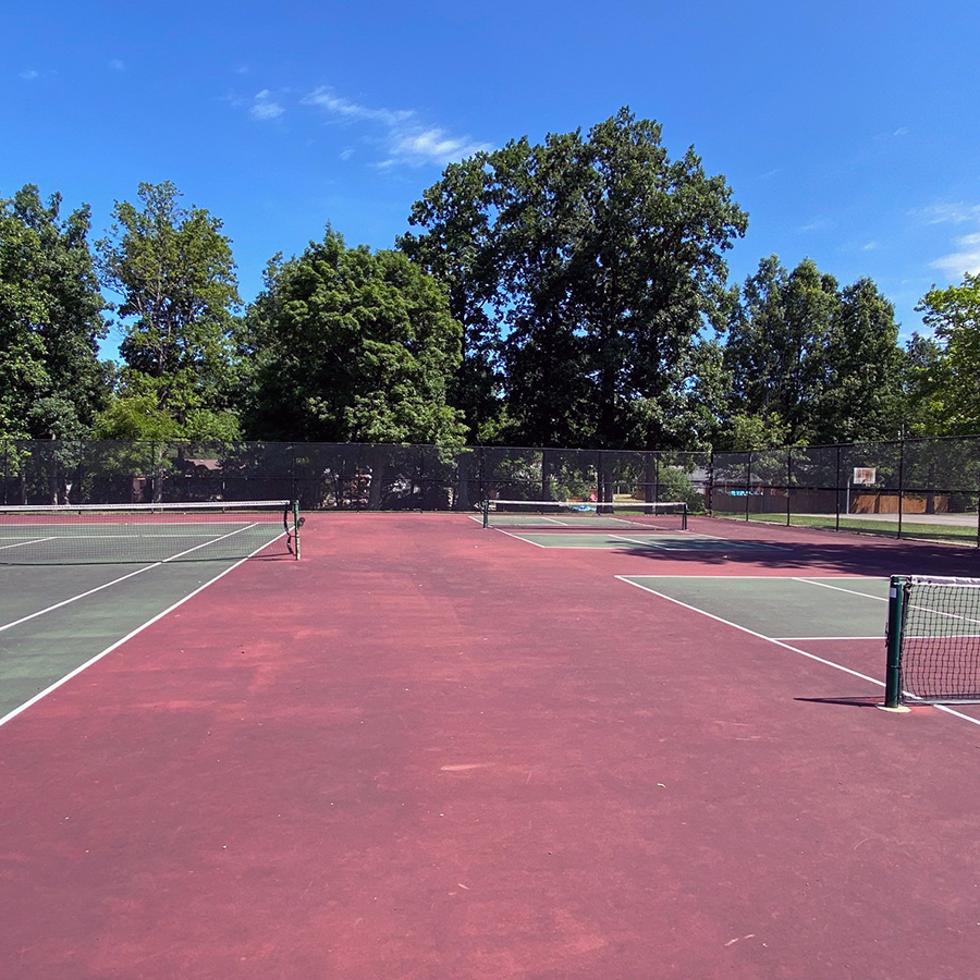 tennis court with green and red surface