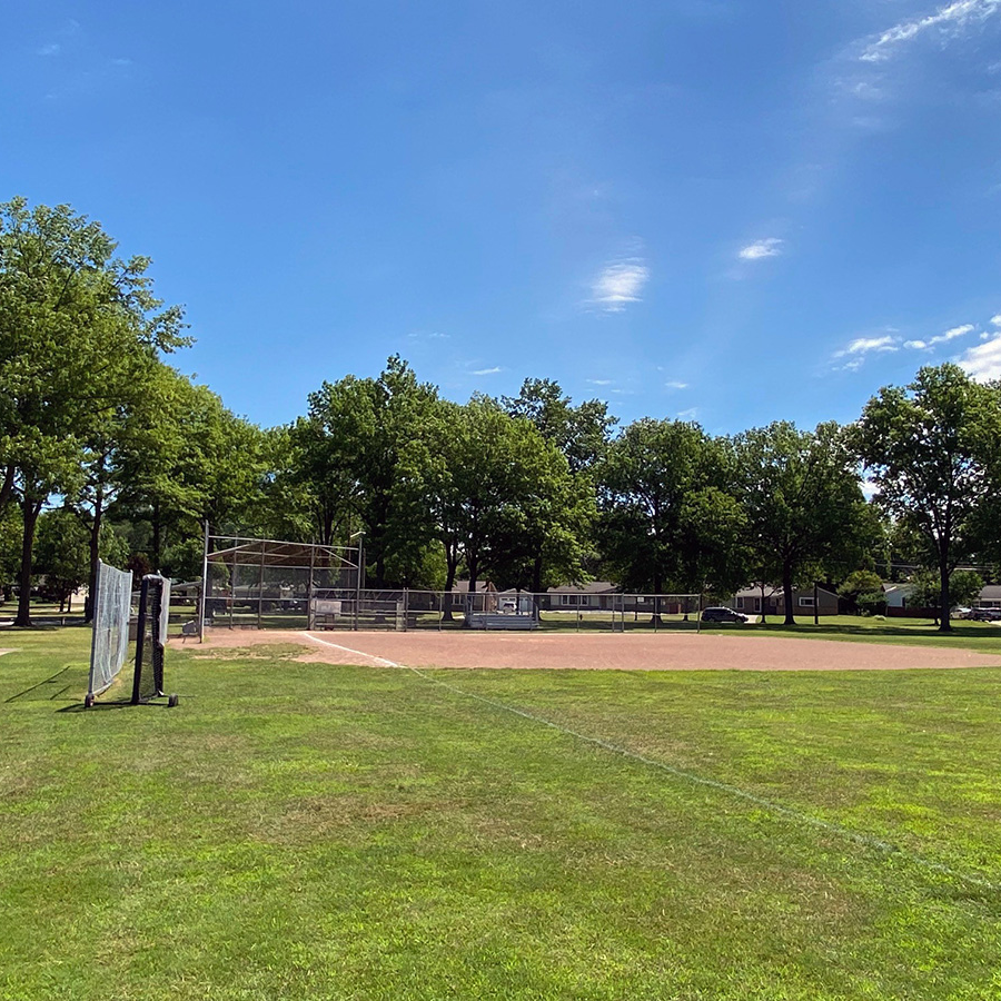 baseball field with trees