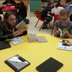 Students reading at a table