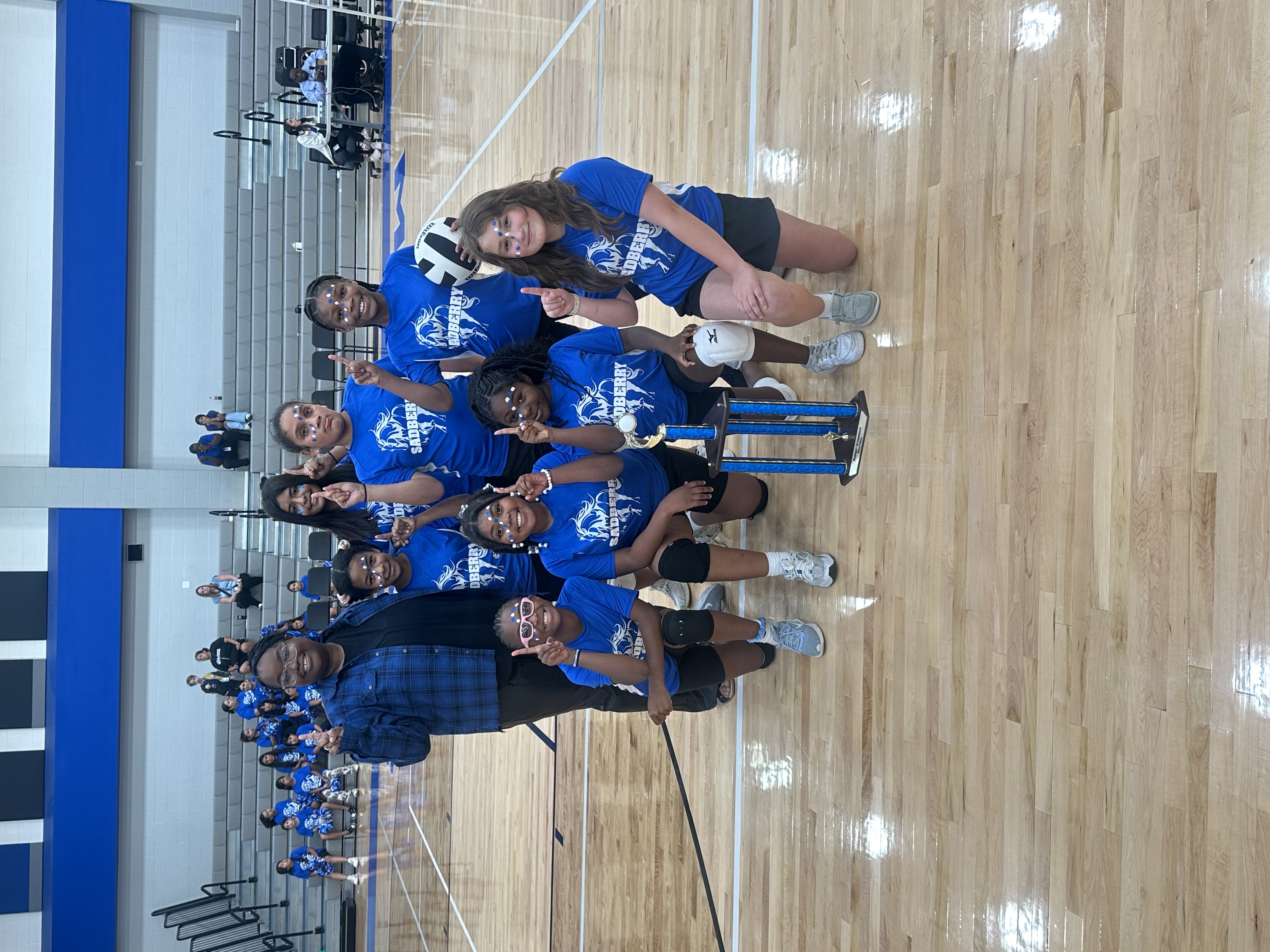 Mrs. Houston and her championship volleyball team