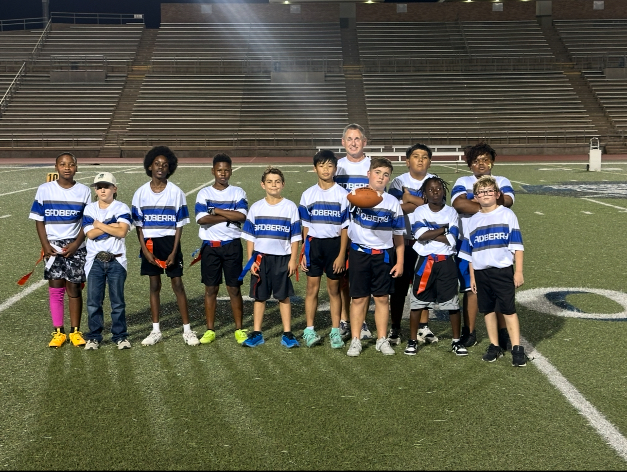 Mr Pohla and his flag football team