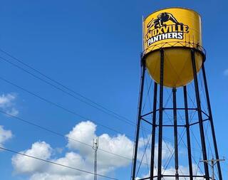 water tower with school logo