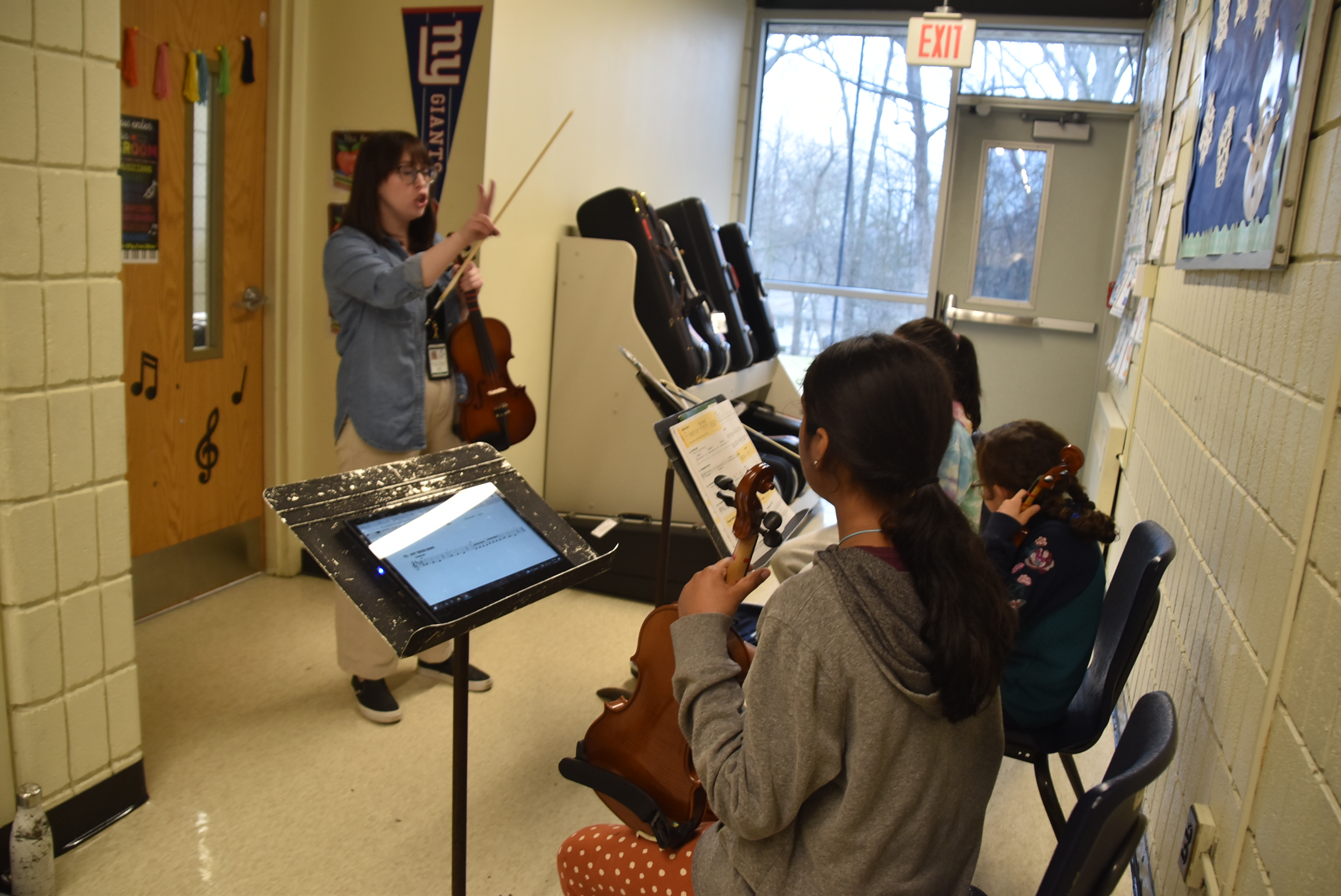 Due to enrollment exceeding the current capacity of the district's five elementary schools, it is not uncommon for music and other classes to be held in the hallway.