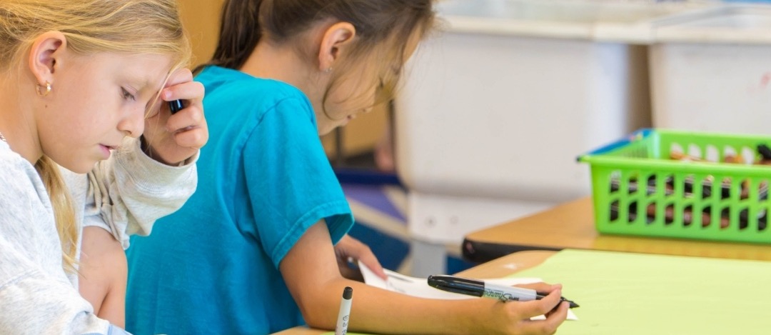 Students drawing in class