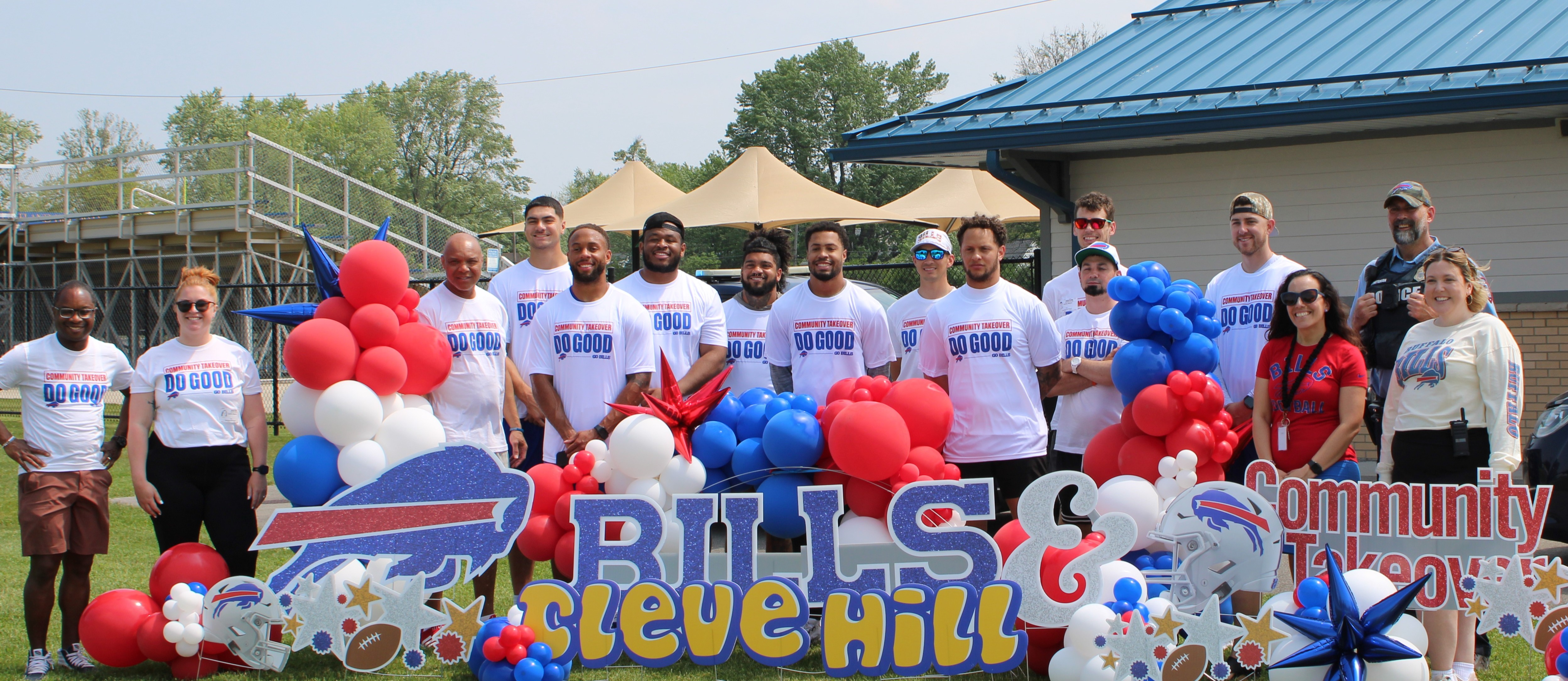 Buffalo Bills players with staff on Bills Community Day