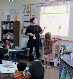 Mrs Sharp and student at whiteboard
