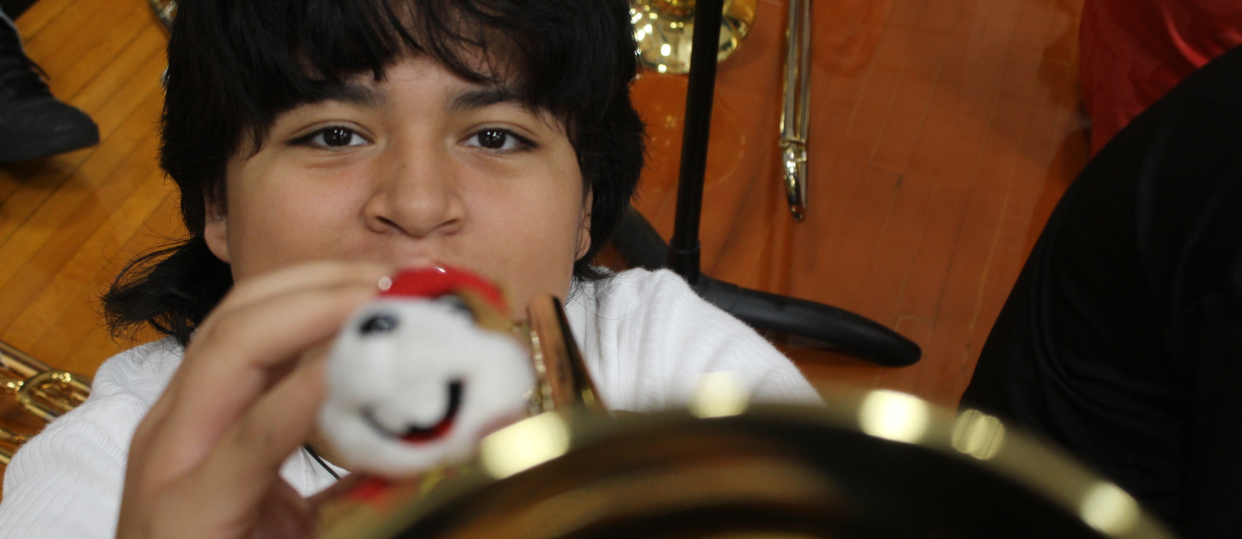 student playing instrument
