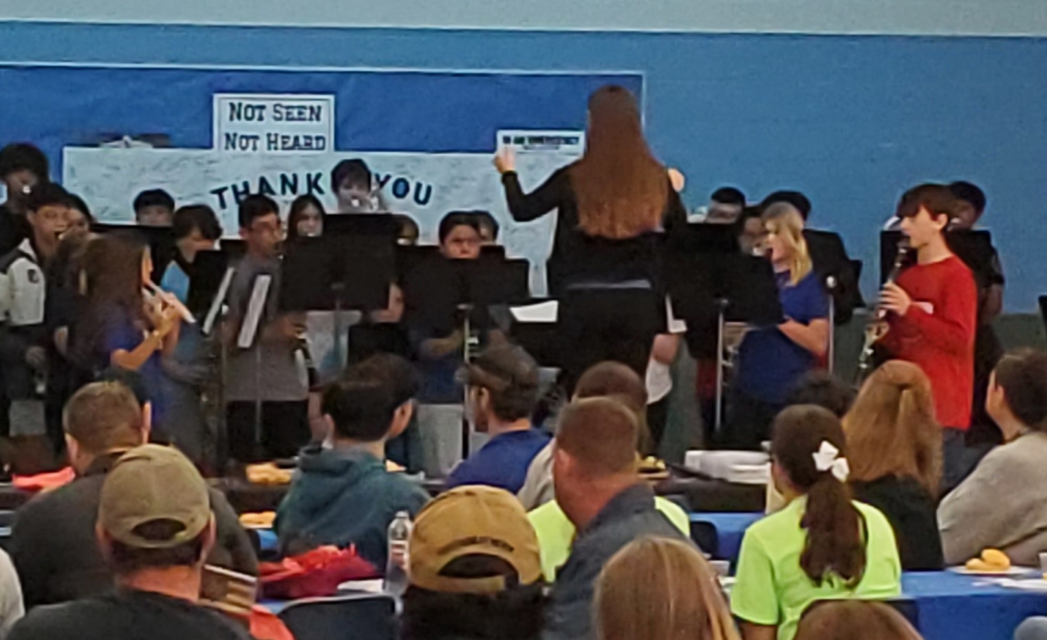 Ms. Klinkner directs the band.