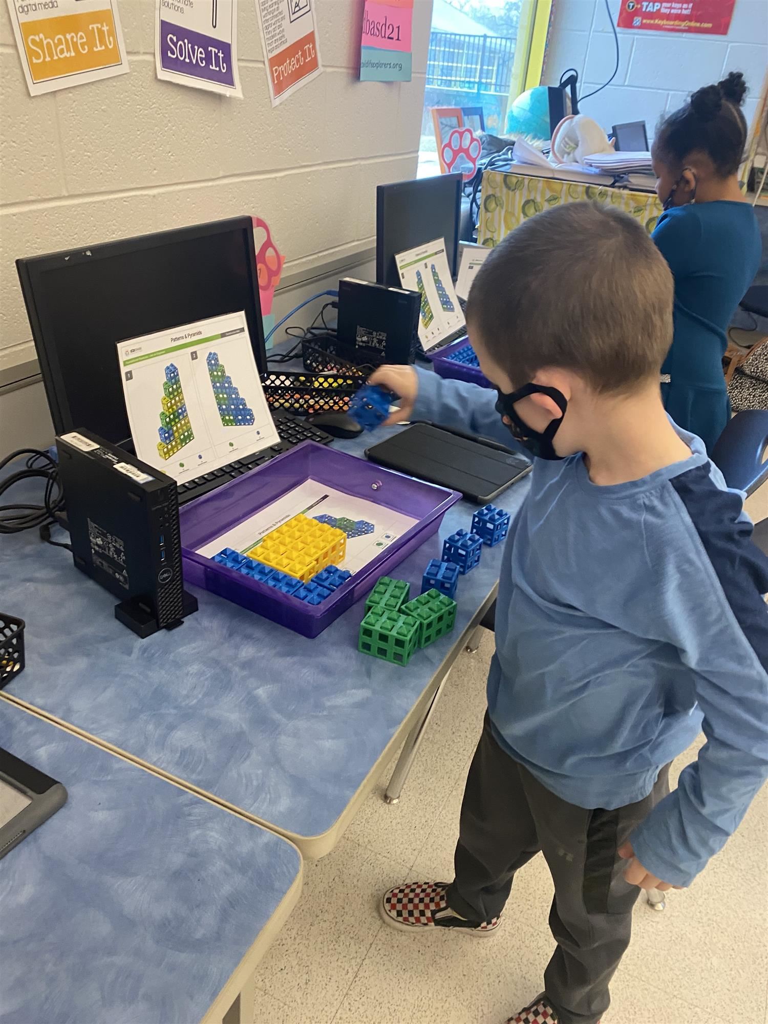 kid working on computer