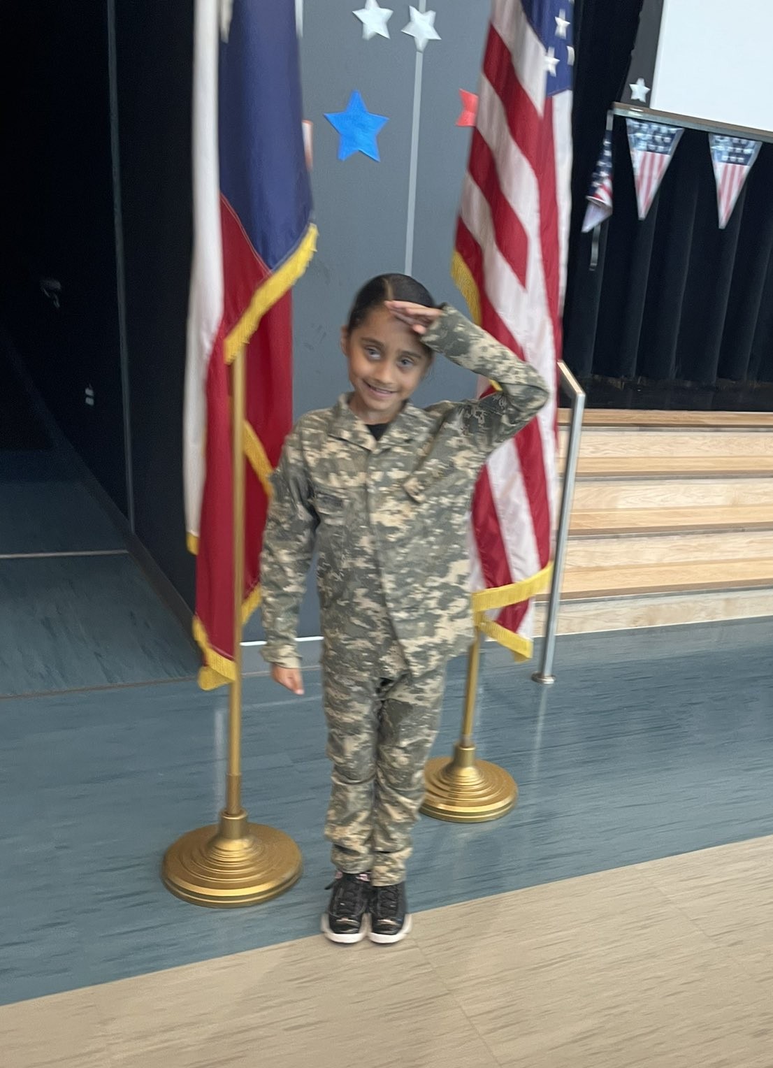 Student with USA nad Texas Flag